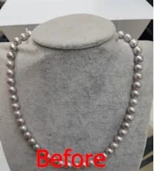 Pendant necklace before AI retouching - uneven exposure